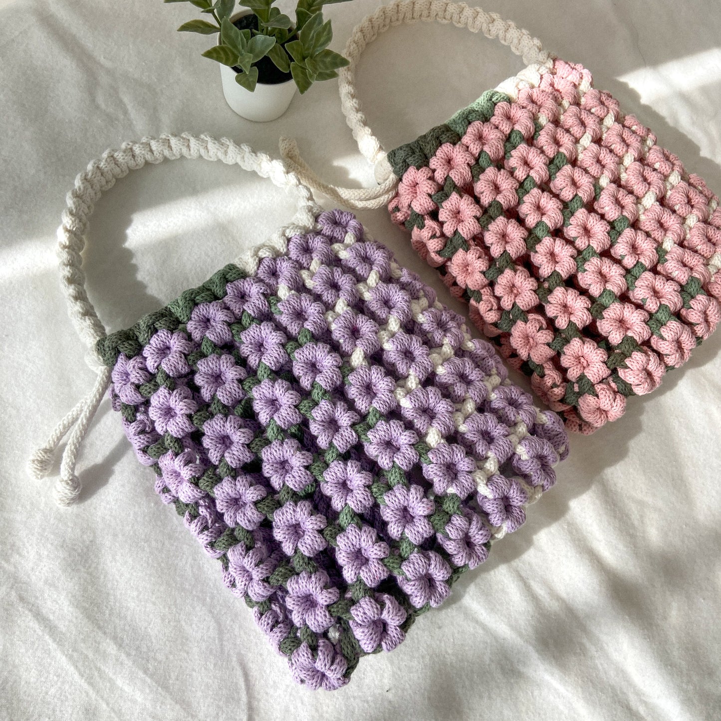 Handwoven macrame flower top handle bag made from sustainable cotton rope, boho summer accessory
